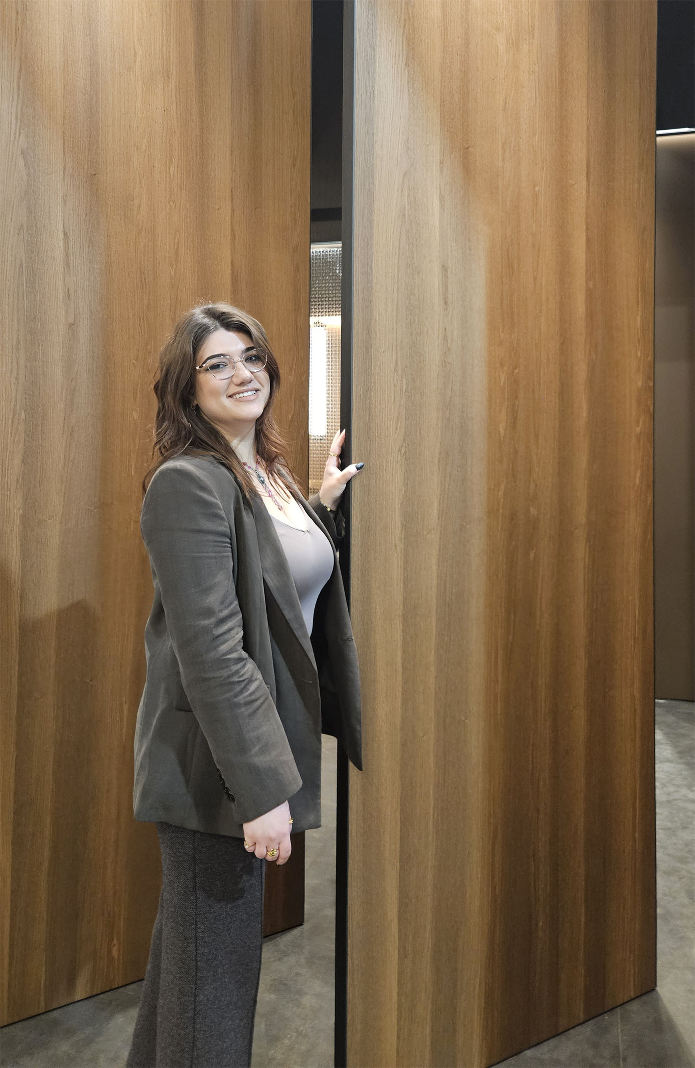 Architect at a custom wood door