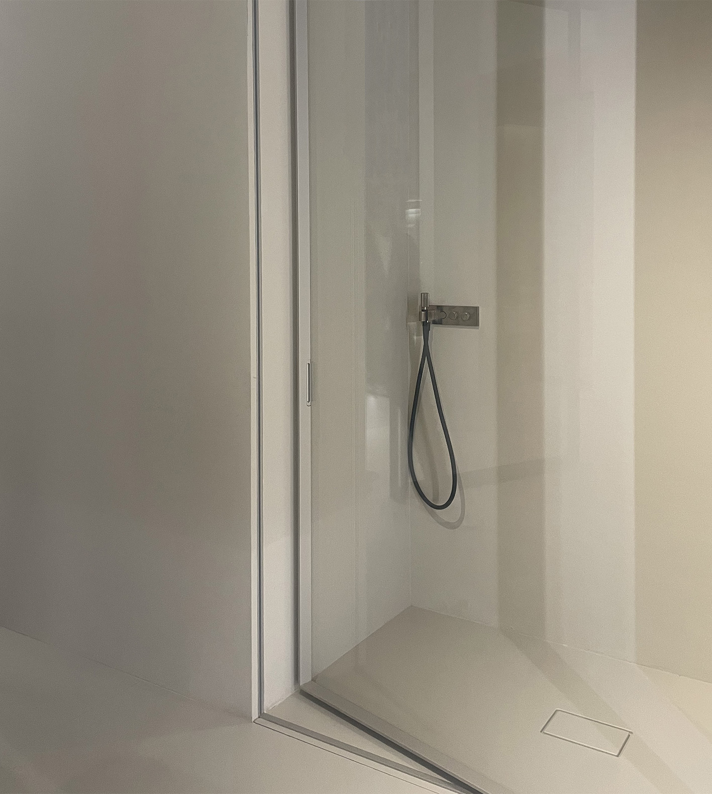 Glass-enclosed walk-in shower