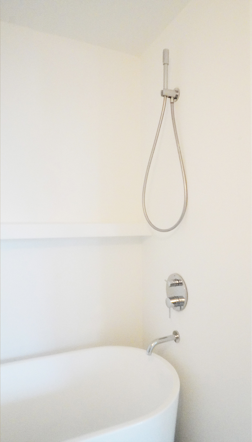 Bathroom with freestanding tub