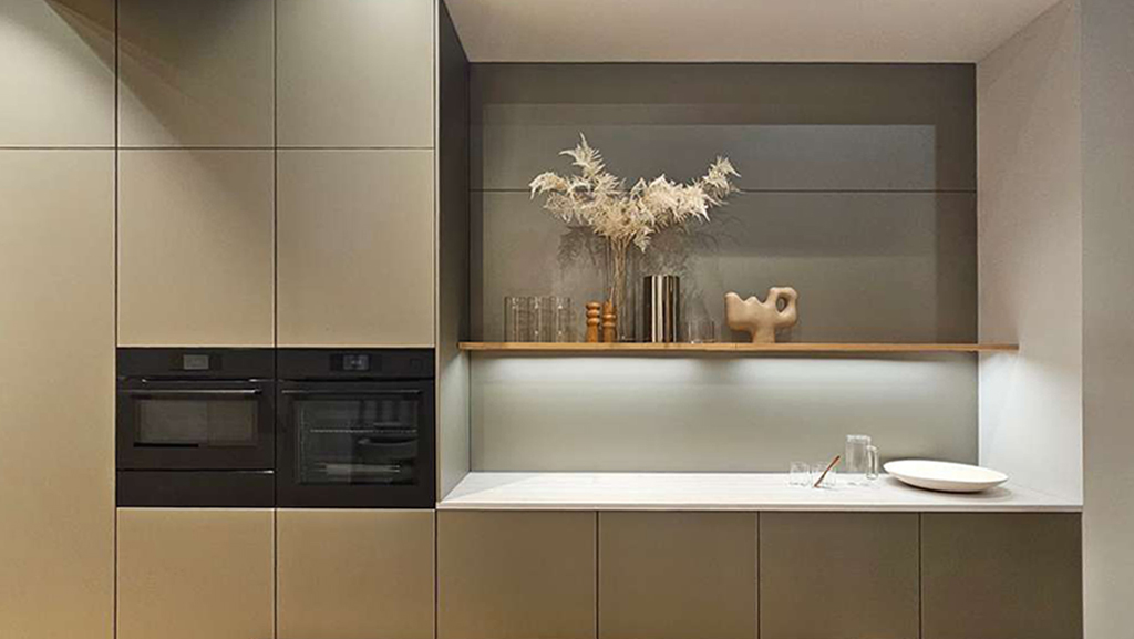 Kitchen with open shelving and integrated appliances